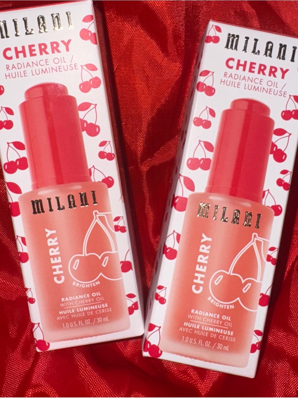 Milani Cherry Radiance Oil — Coral Red & White Packaging